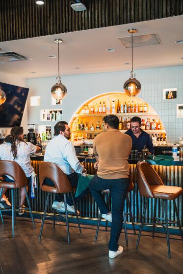 Guests at the bar on a busy night